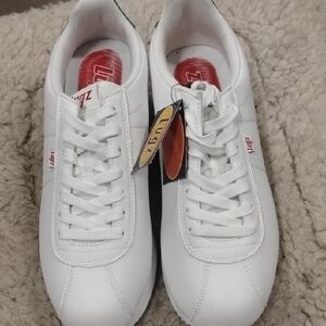 Lugz White Sneakers with Perforated Design and Streamlined Silhouette